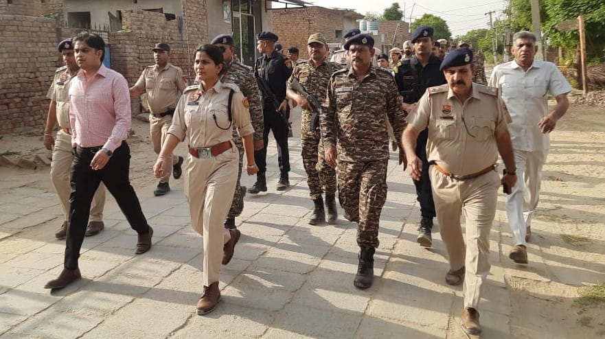 DC and SP took out flag march with police force for peaceful and fair elections