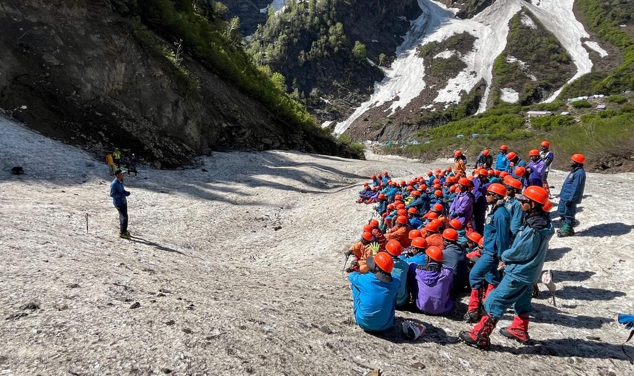 Youth learning to rescue in snow