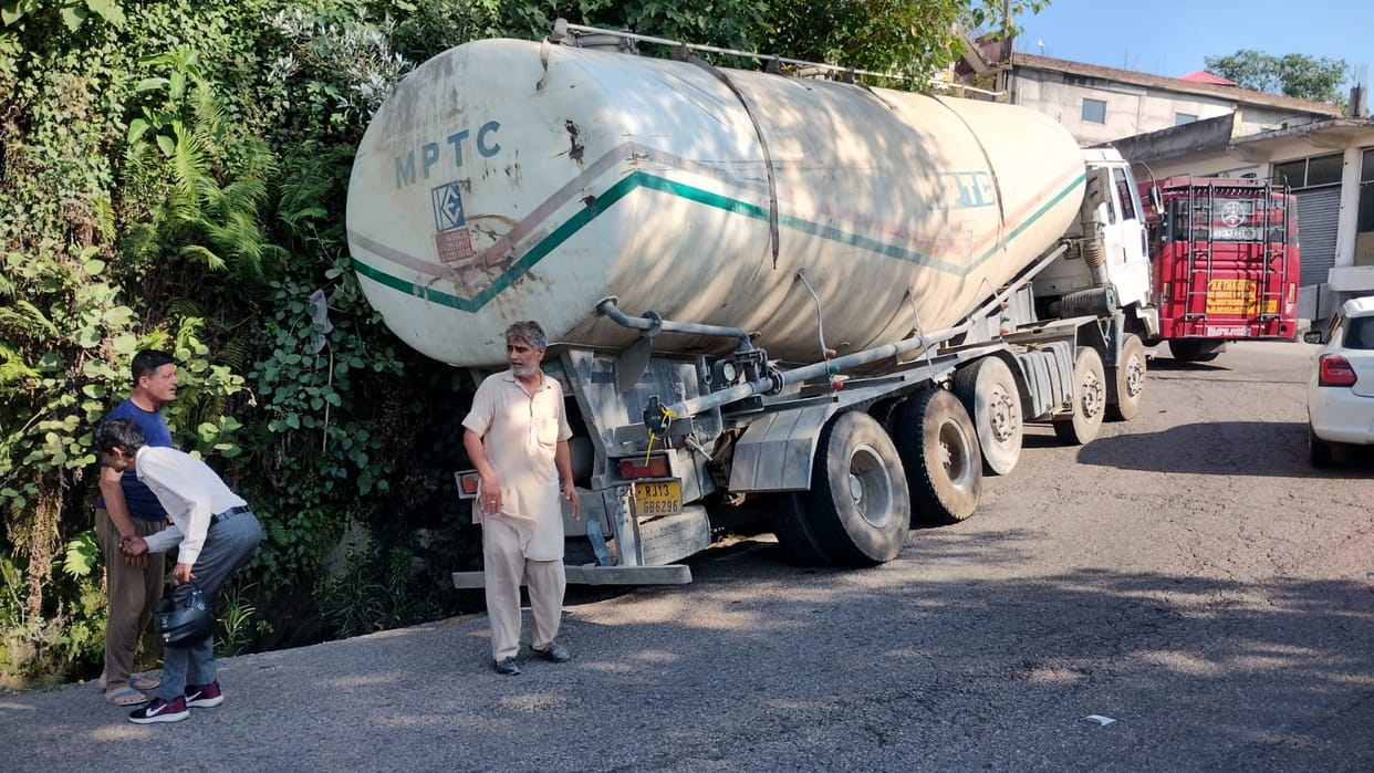 16 tire mixer truck sunk into drain near Bhida