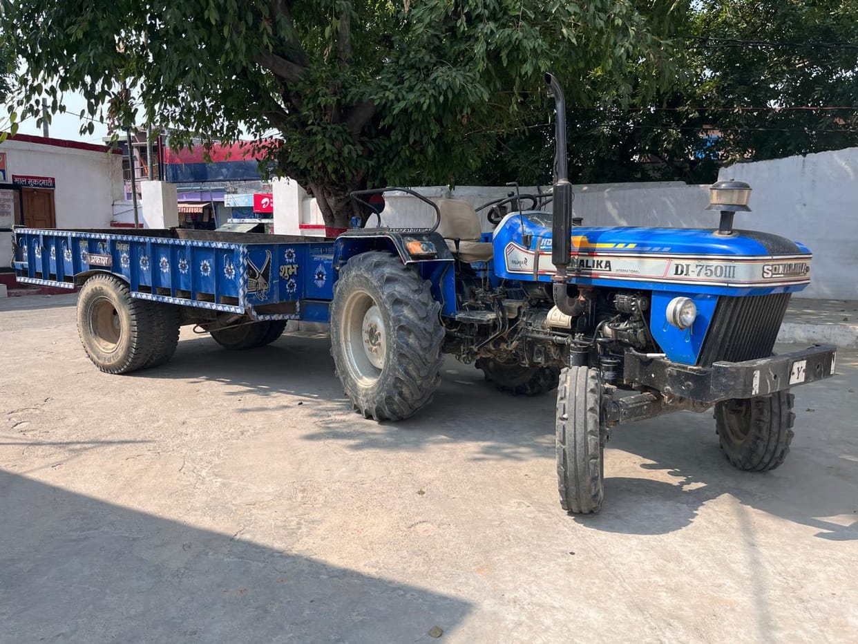 Five tractor-trolleys and one JCB seized