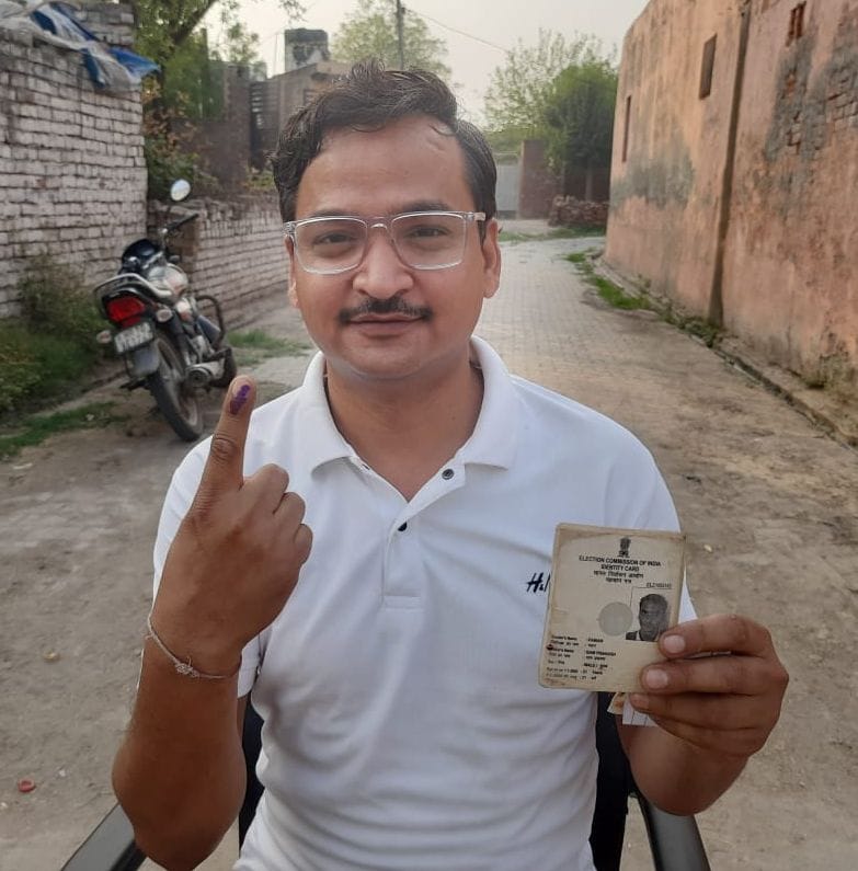 Voters looked excited after being the first to vote at the booths