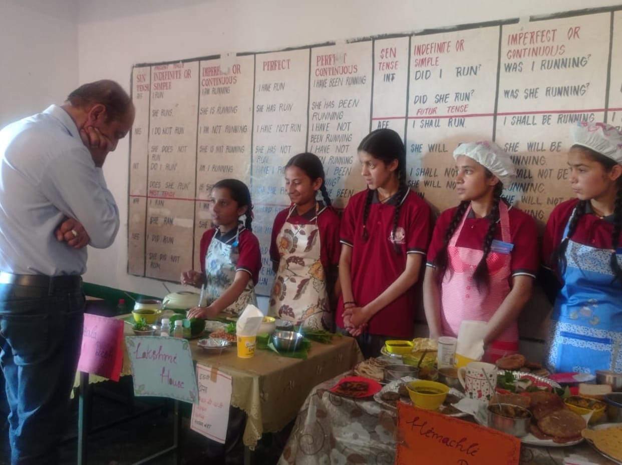 Children set up stalls of dishes from Himachal and Kerala