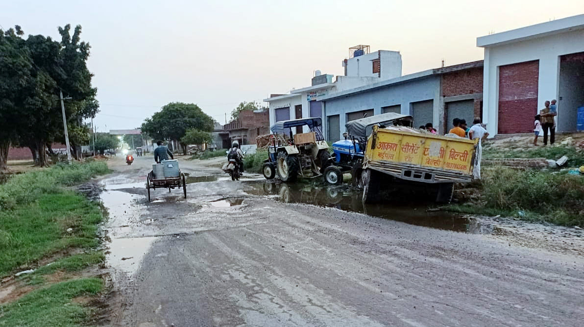 The road became dilapidated due to lack of drain on Wazirganj-Bilsi road