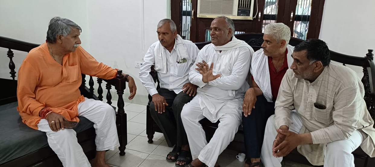 BJP candidate Chaudhary spent time discussing election equations with workers. dharambir singh day