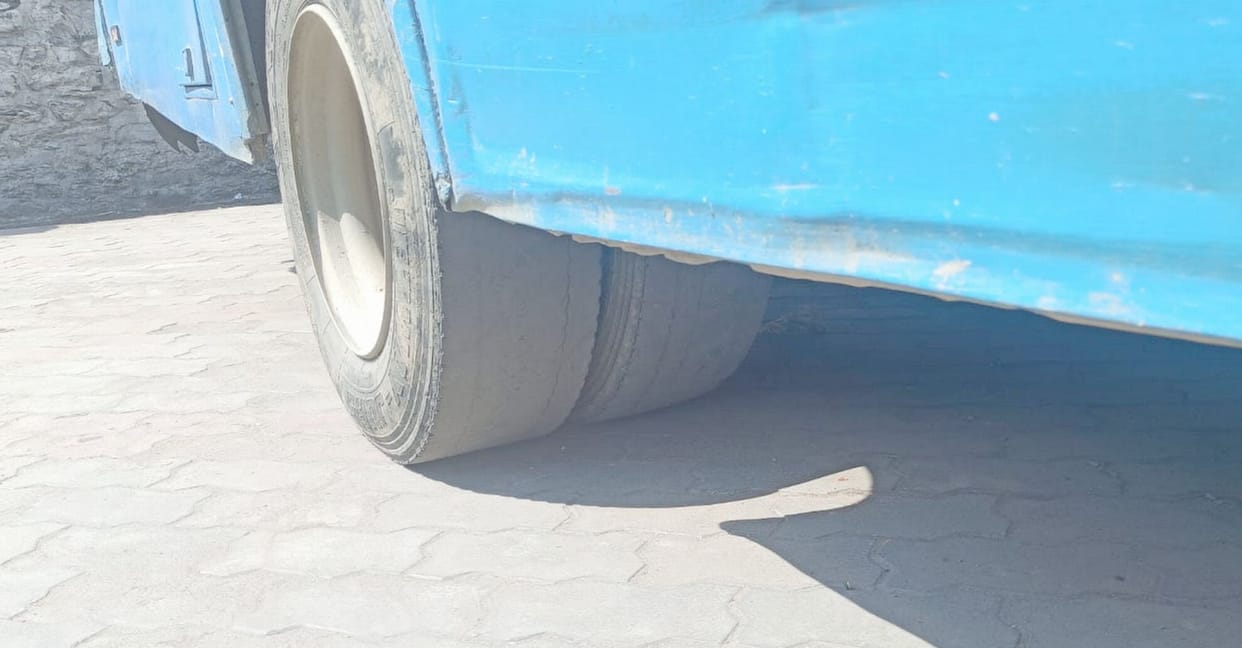 Buses running with cracks in glass, torn seats, bald tires
