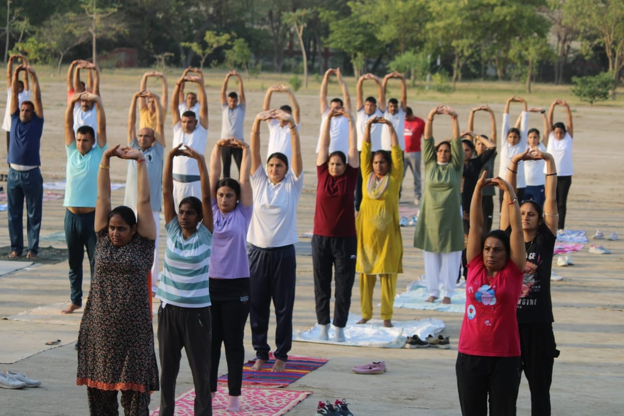 Police shed sweat in yoga camp