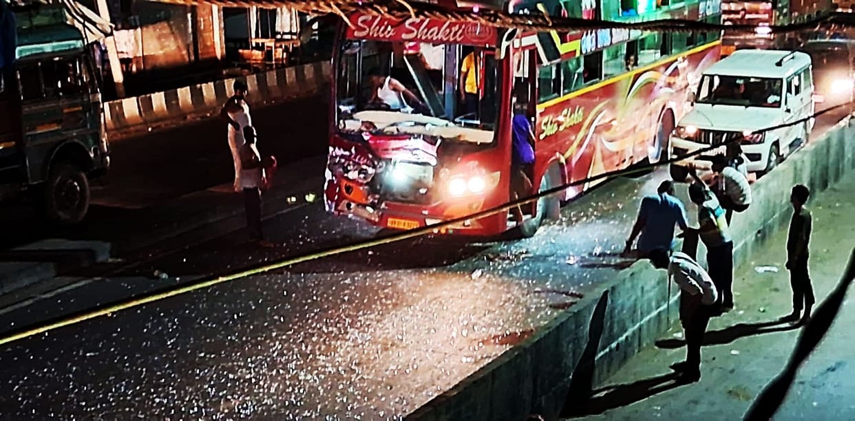 Tourist bus collides with truck on highway, two injured including driver