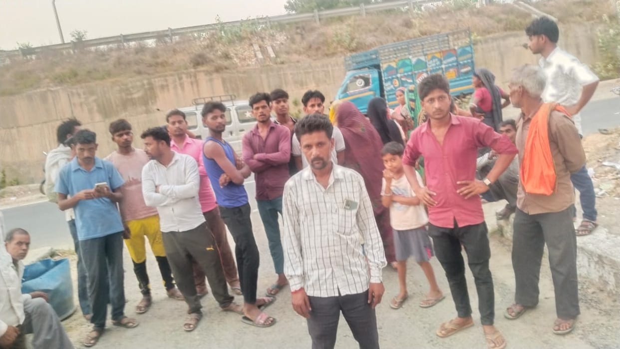 Dozens of people surrounded the police station