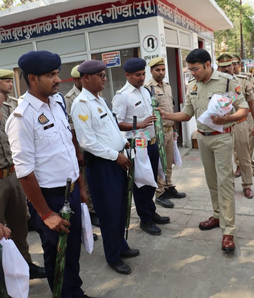 Water bottles, glasses and umbrellas were given to the traffic police to protect them from the heat