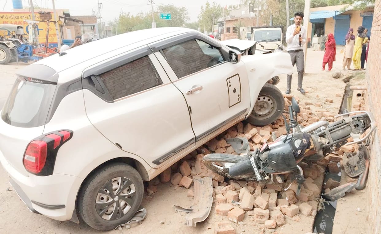 The car dragged the bike rider after the collision