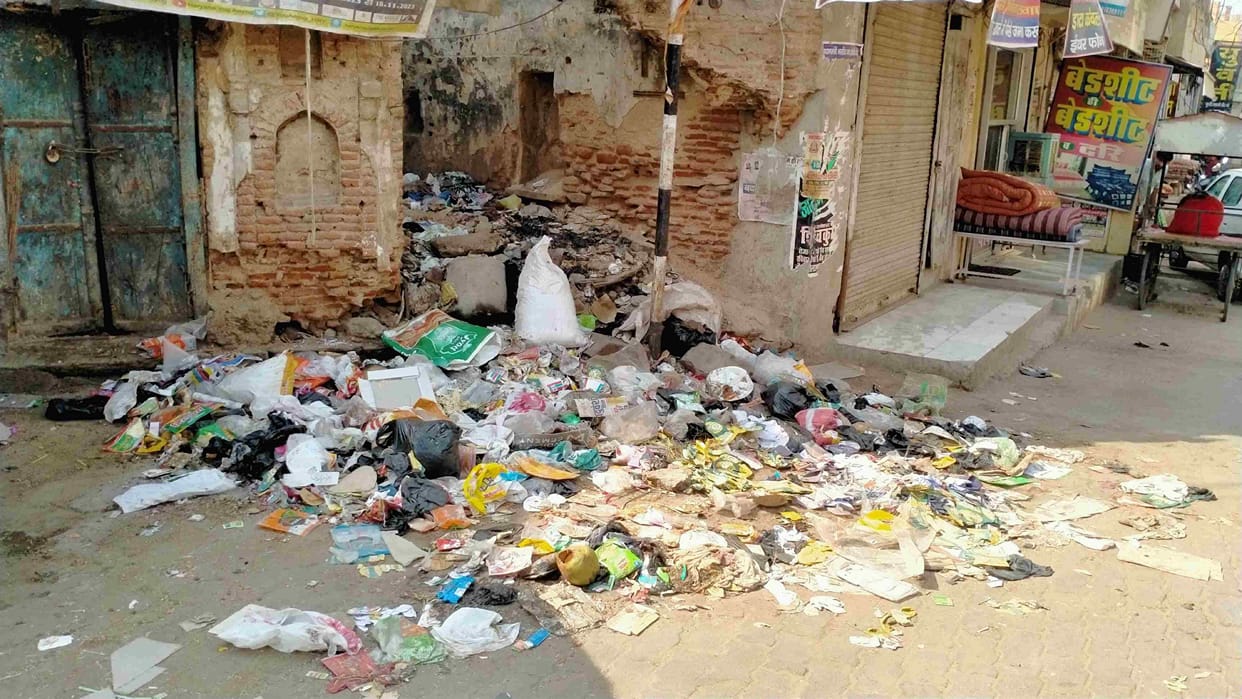 The city's sanitation system is in disarray, garbage piles everywhere