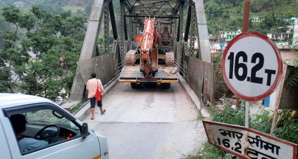 Overloaded vehicles passing through Bhujgarh bridge