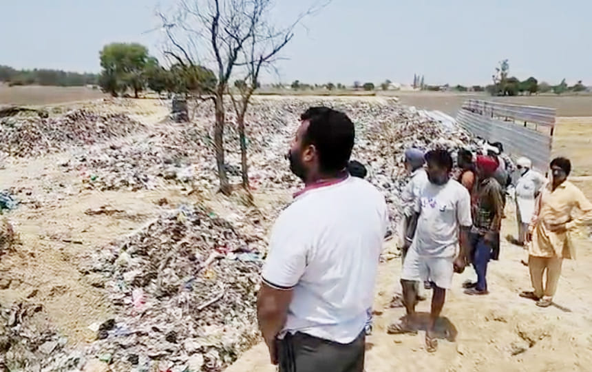 Garbage is flying from the dumping point and reaching the fields, upset villagers warn of protest