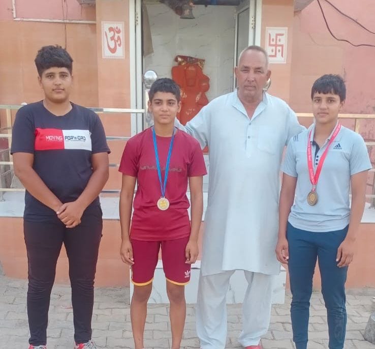 Daughters brought fame by winning medals in wrestling competition