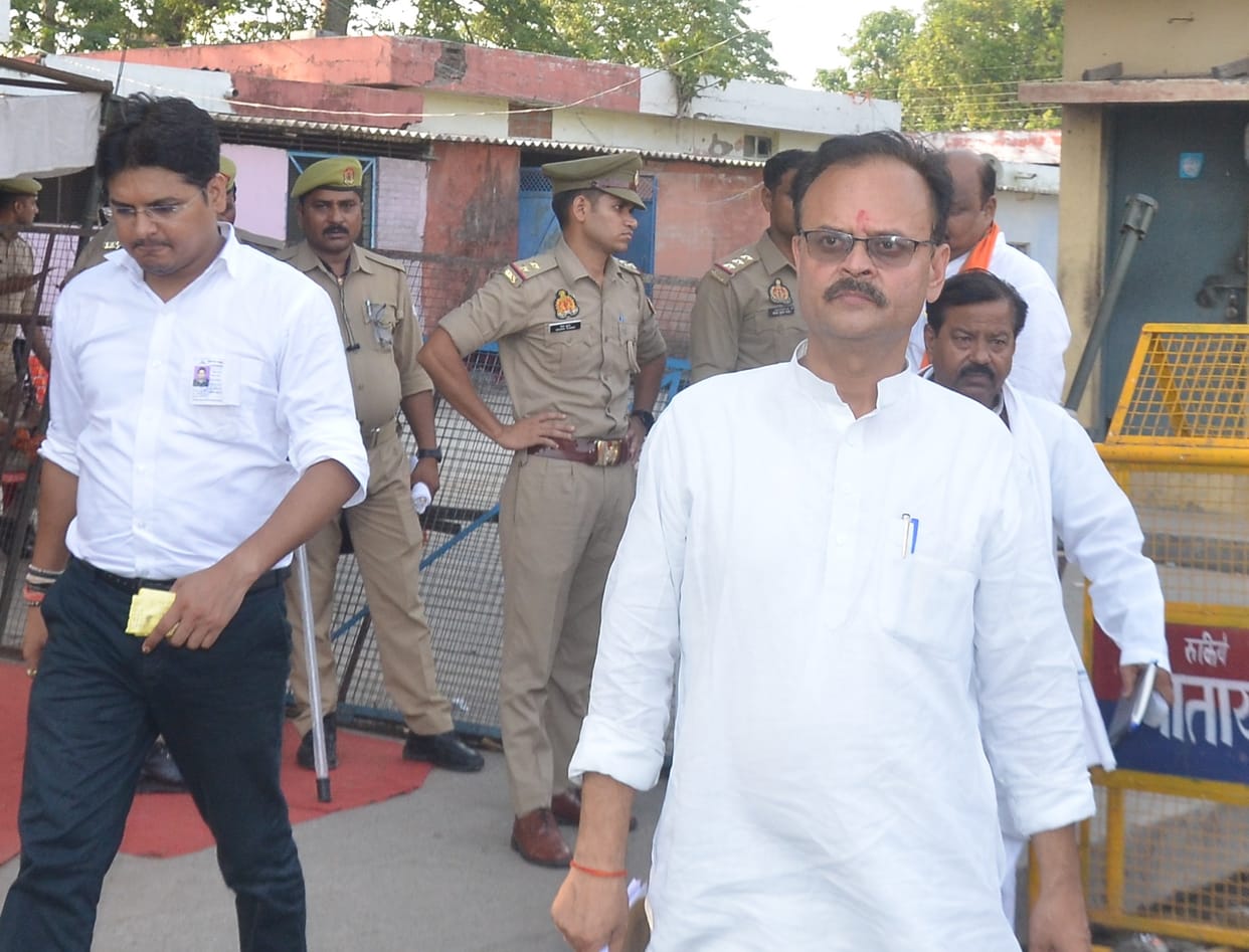 BJP workers left the counting venue after noon, wiping their sweat.