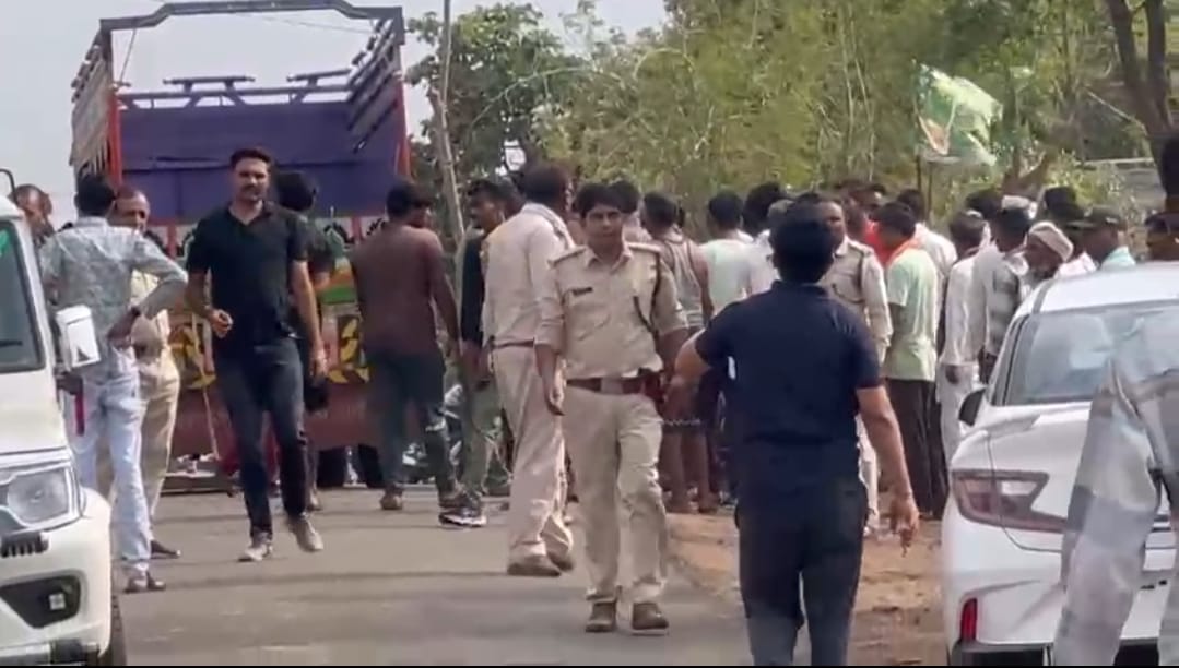 Smugglers, who were illegally cutting trees, started throwing logs of wood