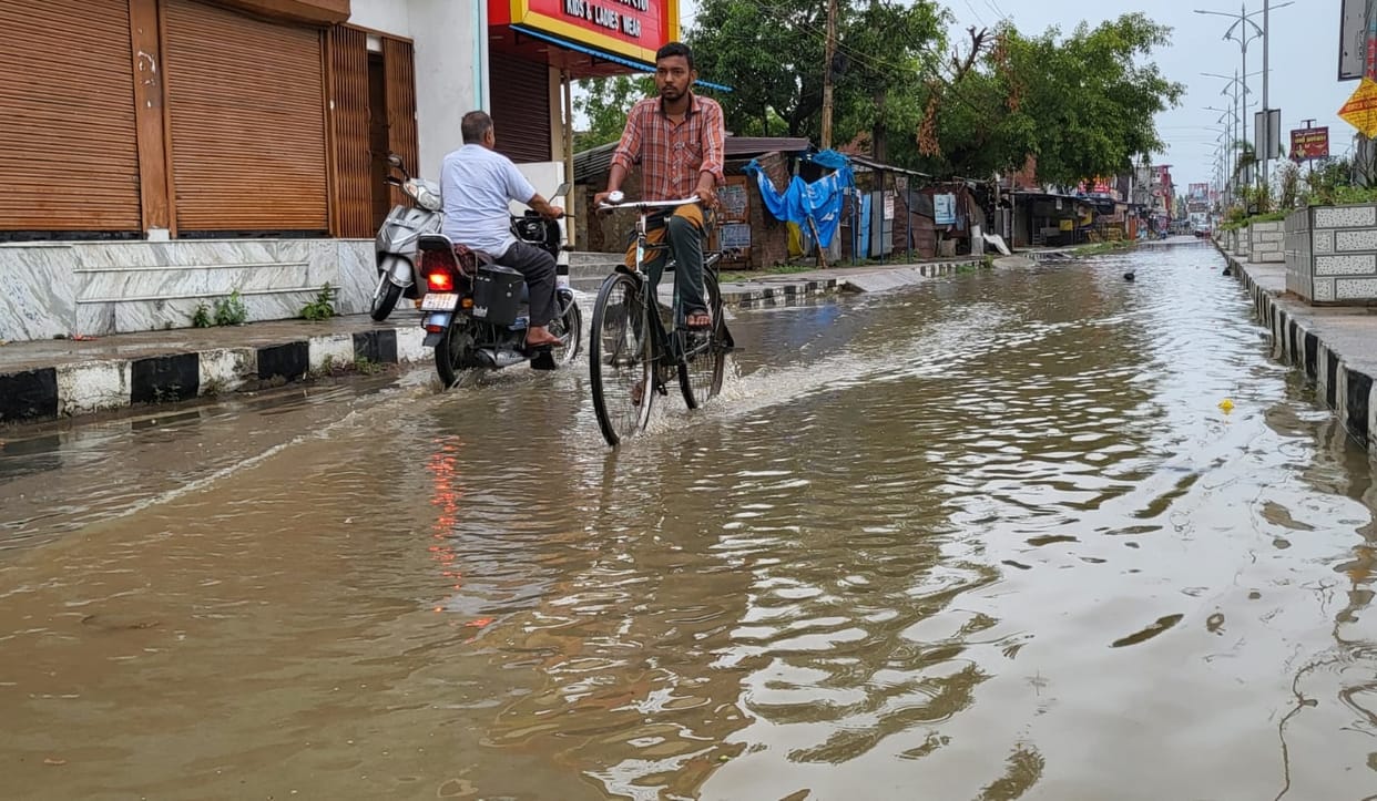 Poles fell due to strong storm... sheds blown away, city roads submerged