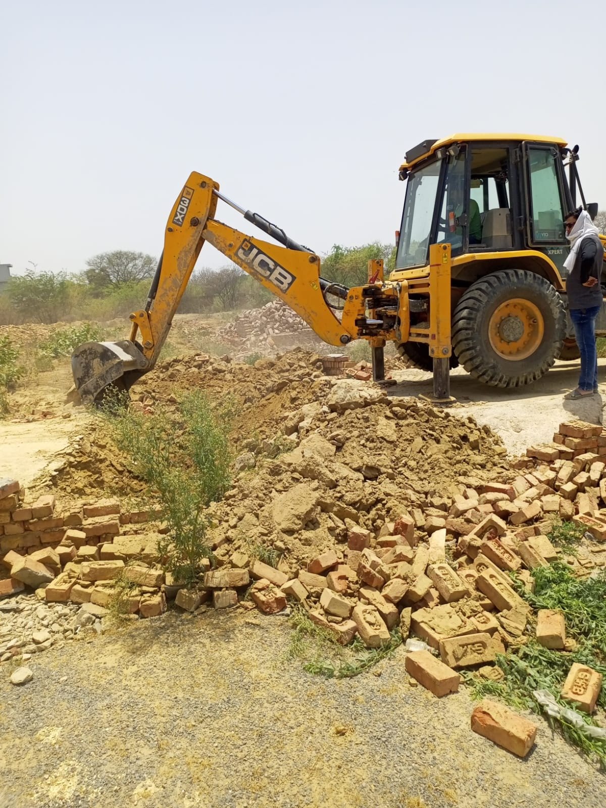 Bulldozer operated in illegal colony