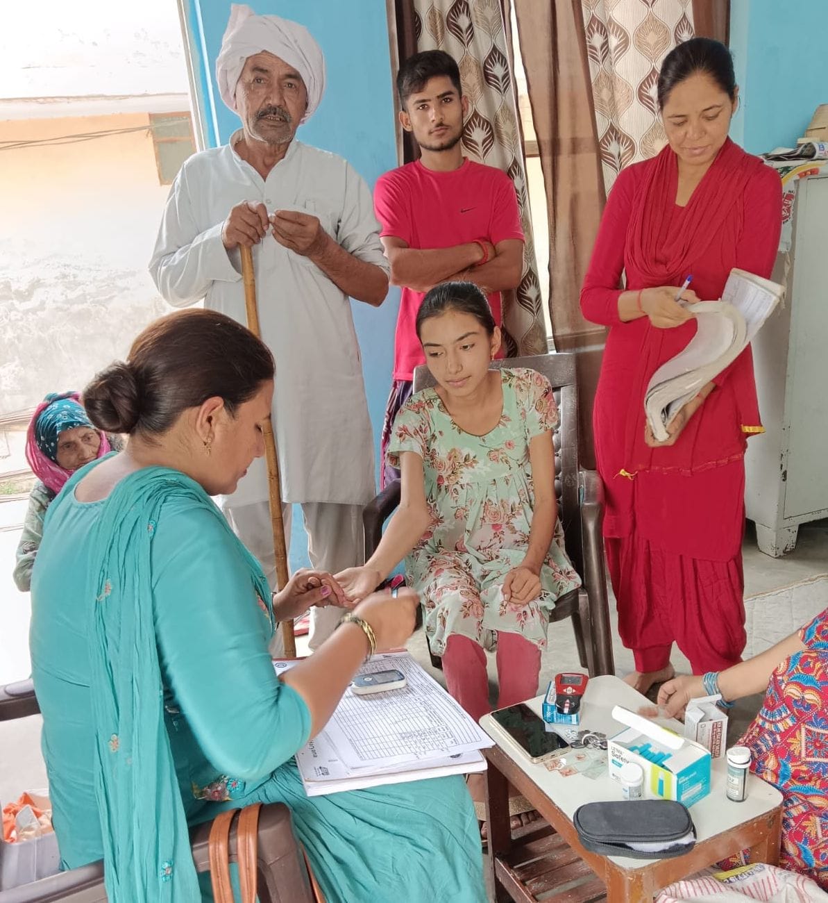 Health workers went door to door and made people aware about seasonal diseases.