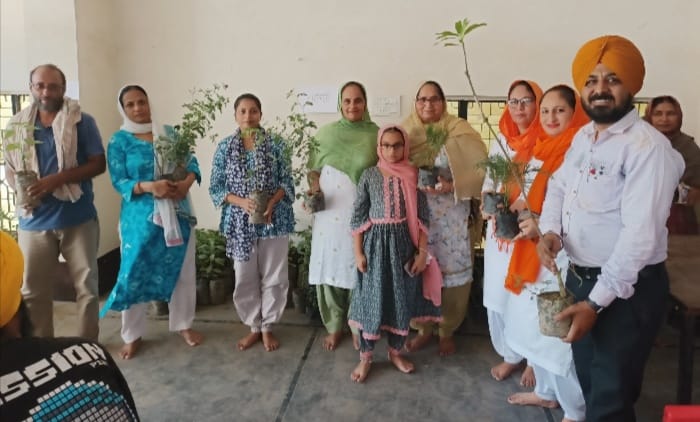 Sharbat and plants distributed by setting up a drinking stall