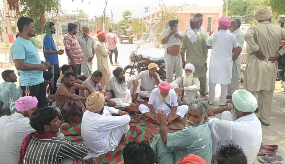 Troubled by power cuts, farmers protested outside the sub-station for three hours