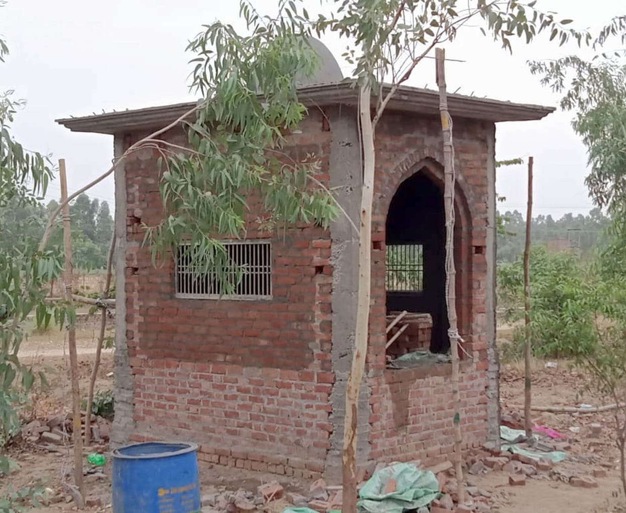Construction of a religious place in the field of an elderly woman, two people caught