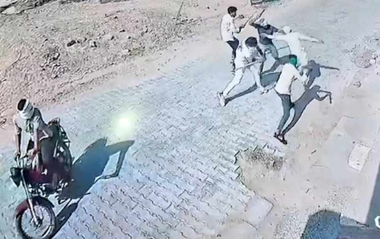 The father of a young man who had a love marriage was chased and beaten by masked men.