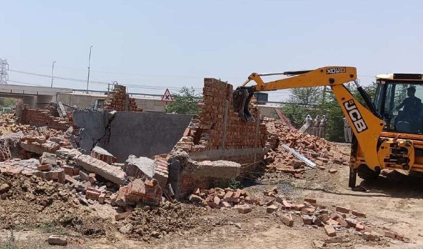 Bulldozer fired on illegal colony being developed on four acres