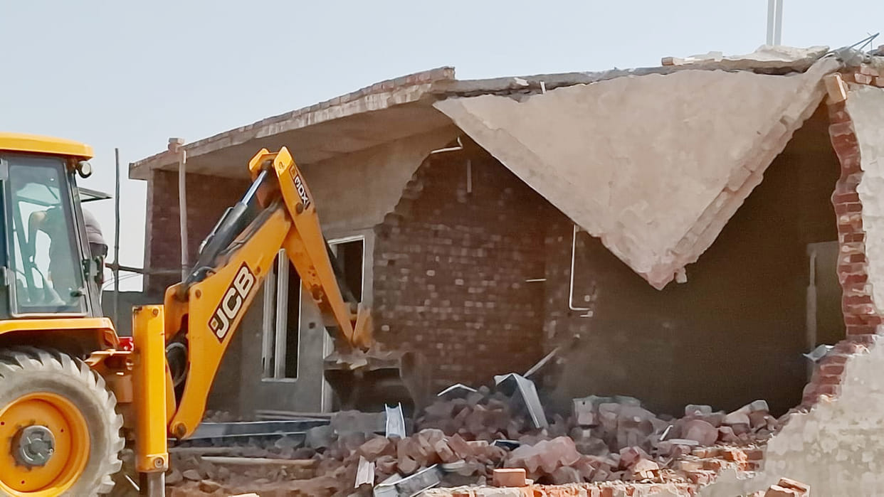 Planning department demolished illegal construction in Idgah Colony