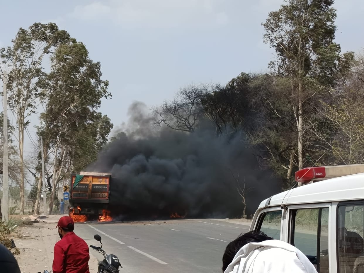 Two trucks caught fire after head-on collision, driver burnt alive