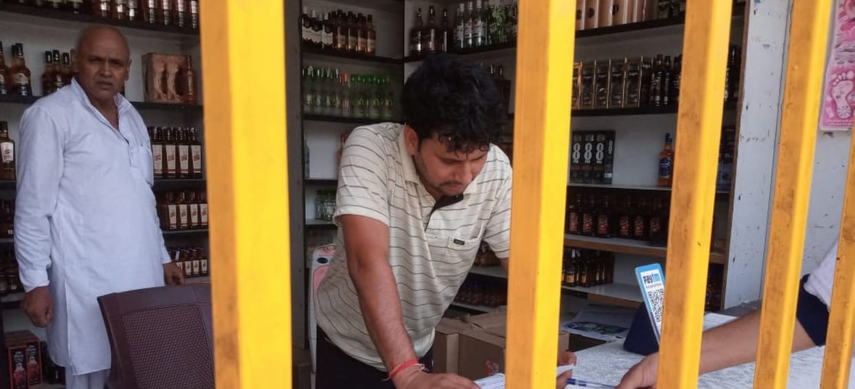 challan of 5 including liquor shop employee