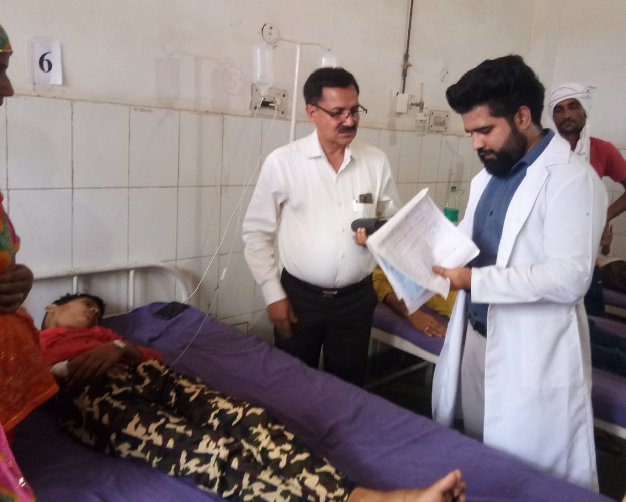 CMO's temper rises after seeing patients standing in the heat