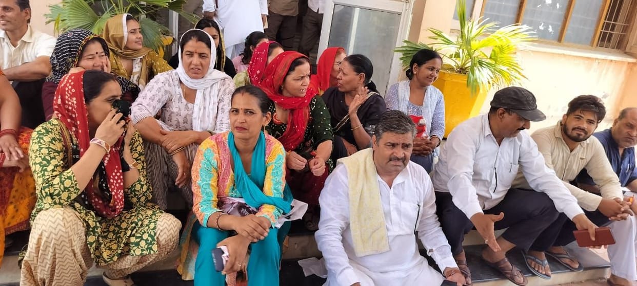 Troubled by the problem of low voltage, Master Colony residents staged a protest.