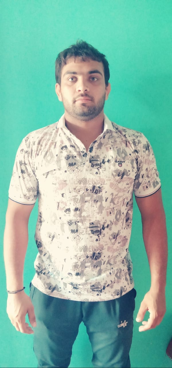 Farmer's son Roshan is making a name for himself by winning a medal in power lifting.