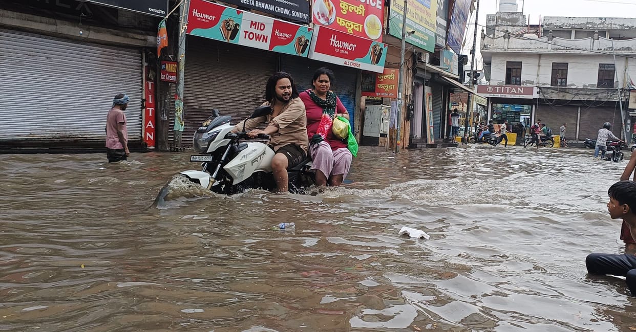 The sun remained shining till noon, then it rained heavily, roads were filled with water up to two feet.