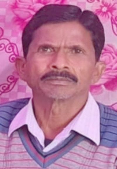 Two farmers travelling on a tractor-trolley died in a collision with a truck