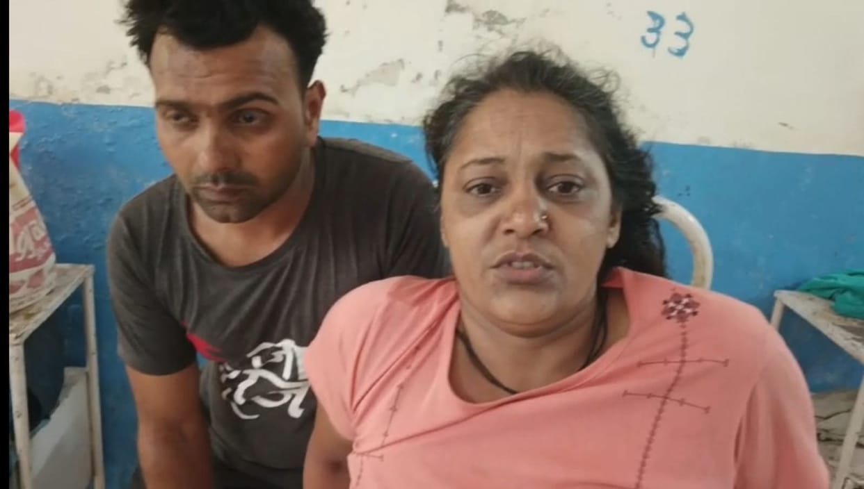 Shot fired at woman, if it did not hit then tried to burn her by sprinkling oil on her.