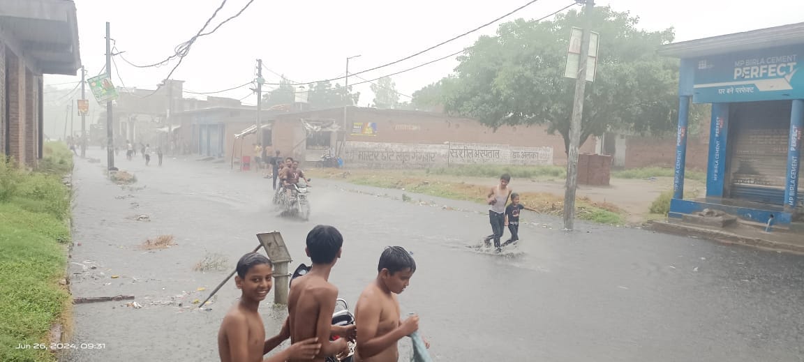Roads filled with water due to first rain, relief from heat
