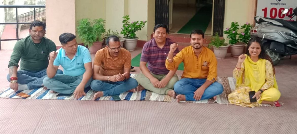Employees staged a sit-in protest against the reduction of posts