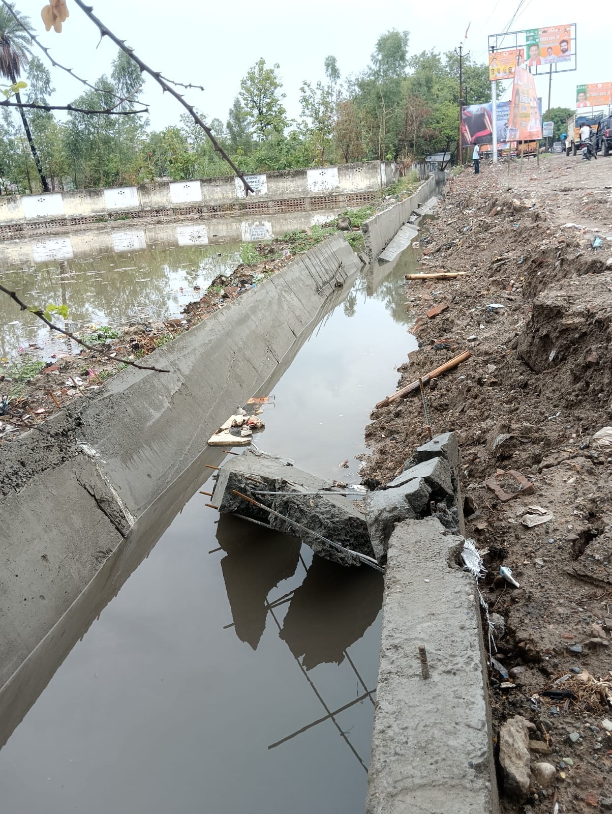 Rain washed away corruption...45 lakhs washed away due to drain collapse