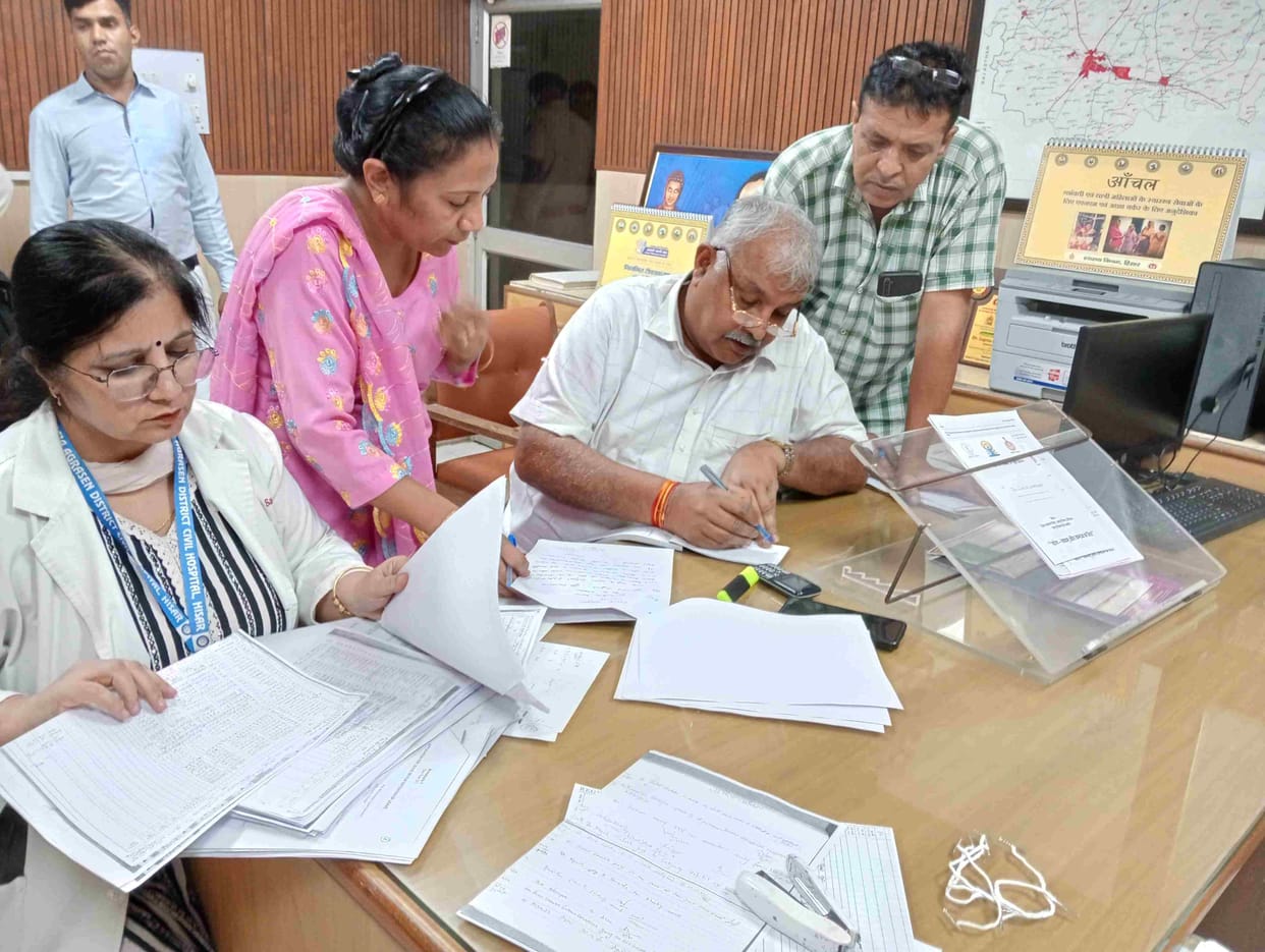 Chief Minister Flying Squad team checking records in Civil Hospital.
