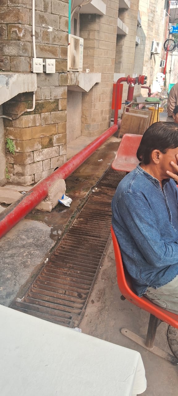 Sewerage pipe leaking near senior citizen's slip counter