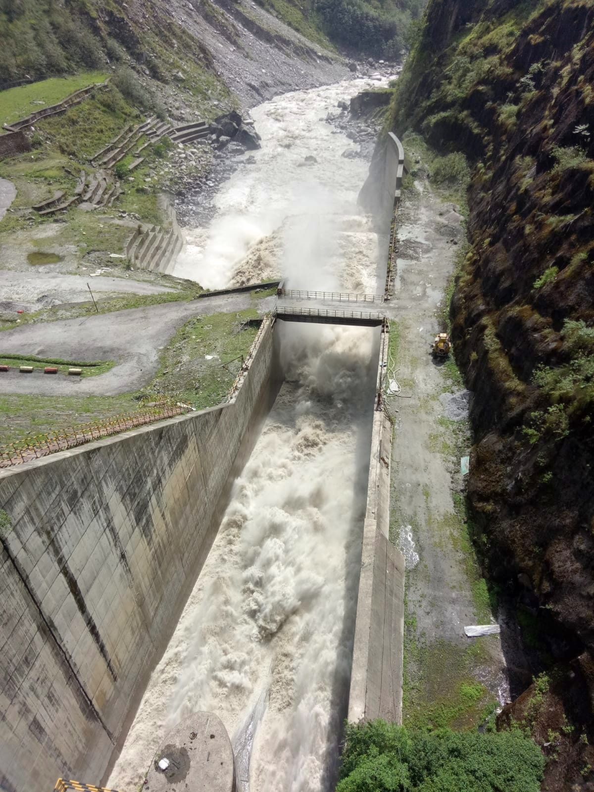 Water released from both gates of Dhauliganga reservoir after rain