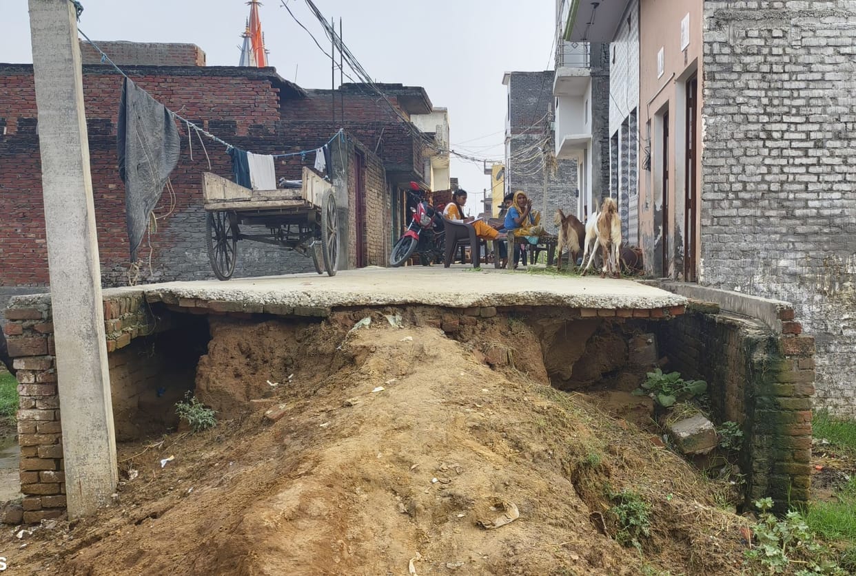 Road and drain collapsed in rain