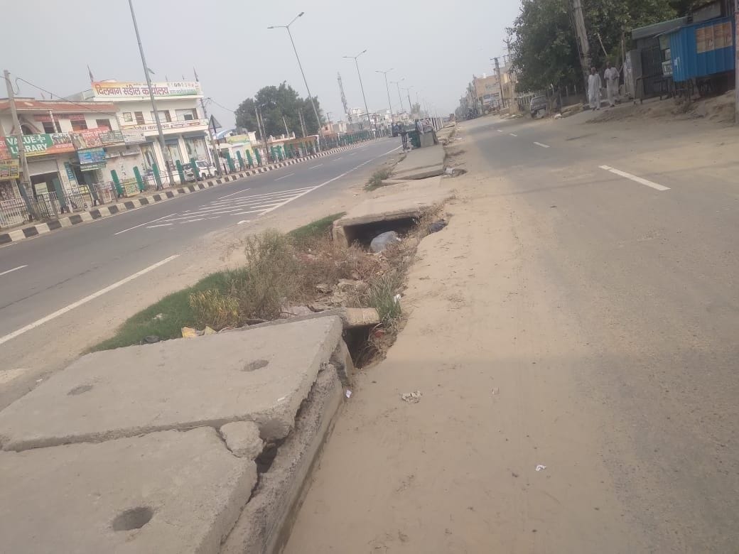 The drain on the service road is clogged with dirt, how will the water come out?