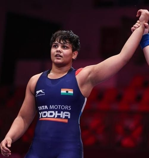 Welcome daughter who returned after winning gold in wrestling today