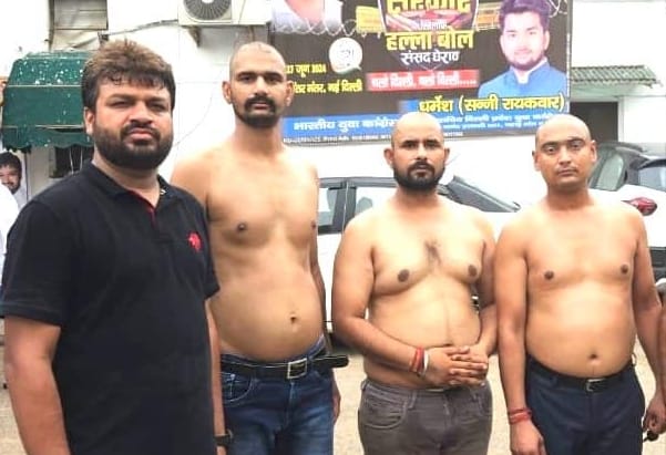 Aman Vashishtha along with his colleagues got shaved outside the Parliament House.