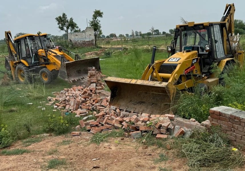 Bulldozer used on unauthorized colonies in 17.5 acres at five places