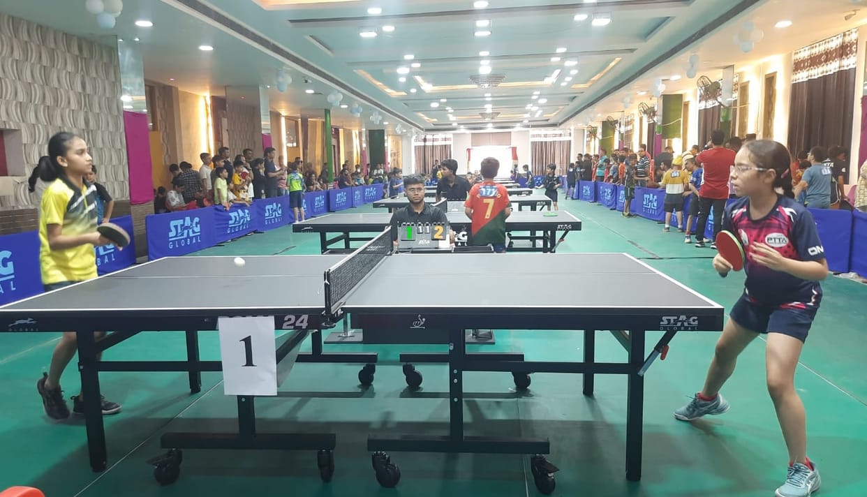Players strive to win in table tennis competition