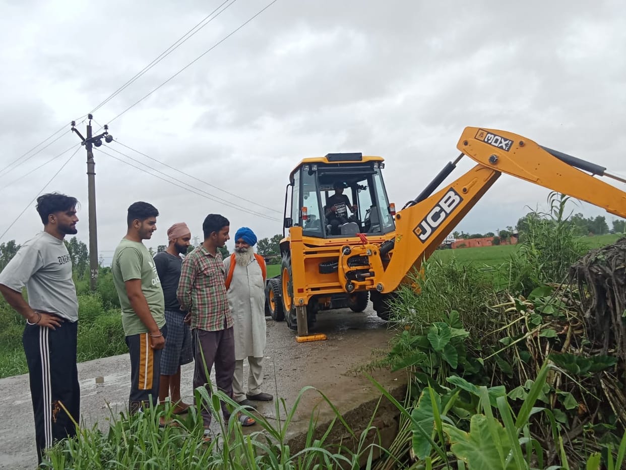 Canal cleaning done with JCB